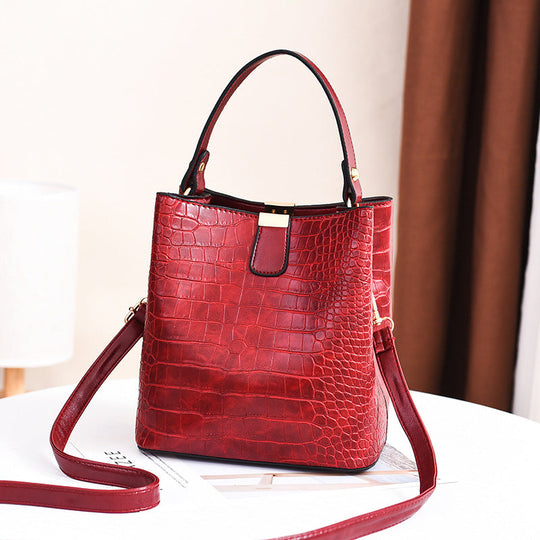 👜 Limited-time 50% off! Shiny crocodile-print handbag with gold hardware 💼