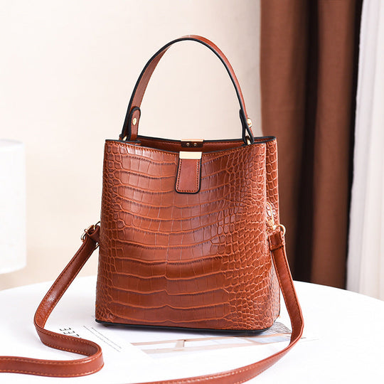 👜 Limited-time 50% off! Shiny crocodile-print handbag with gold hardware 💼